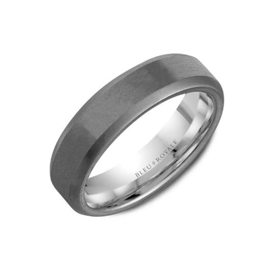 Presenting the Crown Ring Bleu Royale: a tantalum and 14K white gold men's wedding band featuring a round brilliant diamond. This sophisticated design showcases a matte finish with polished beveled edges, while "BLEU ROYALE" is elegantly engraved inside the lustrous inner band. The ring is artfully displayed on a simple white background, embodying understated elegance.