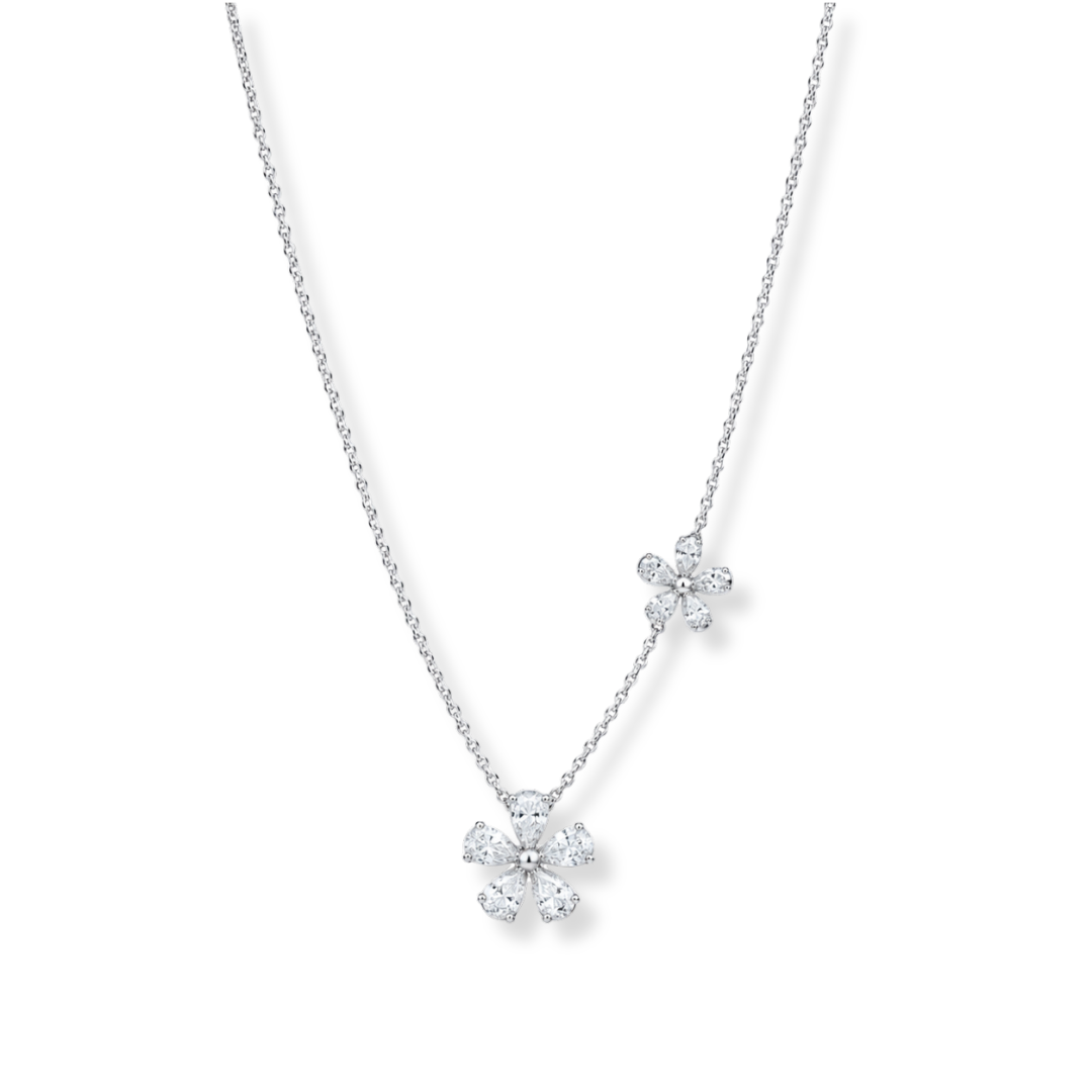 Raffi&Co.® 18K White Gold Diamond Necklace Pendant features two daisy-shaped pendants, each embellished with sparkling G/H, SI-VS clear diamonds totaling 1.65 CTW, shown on a plain white background.