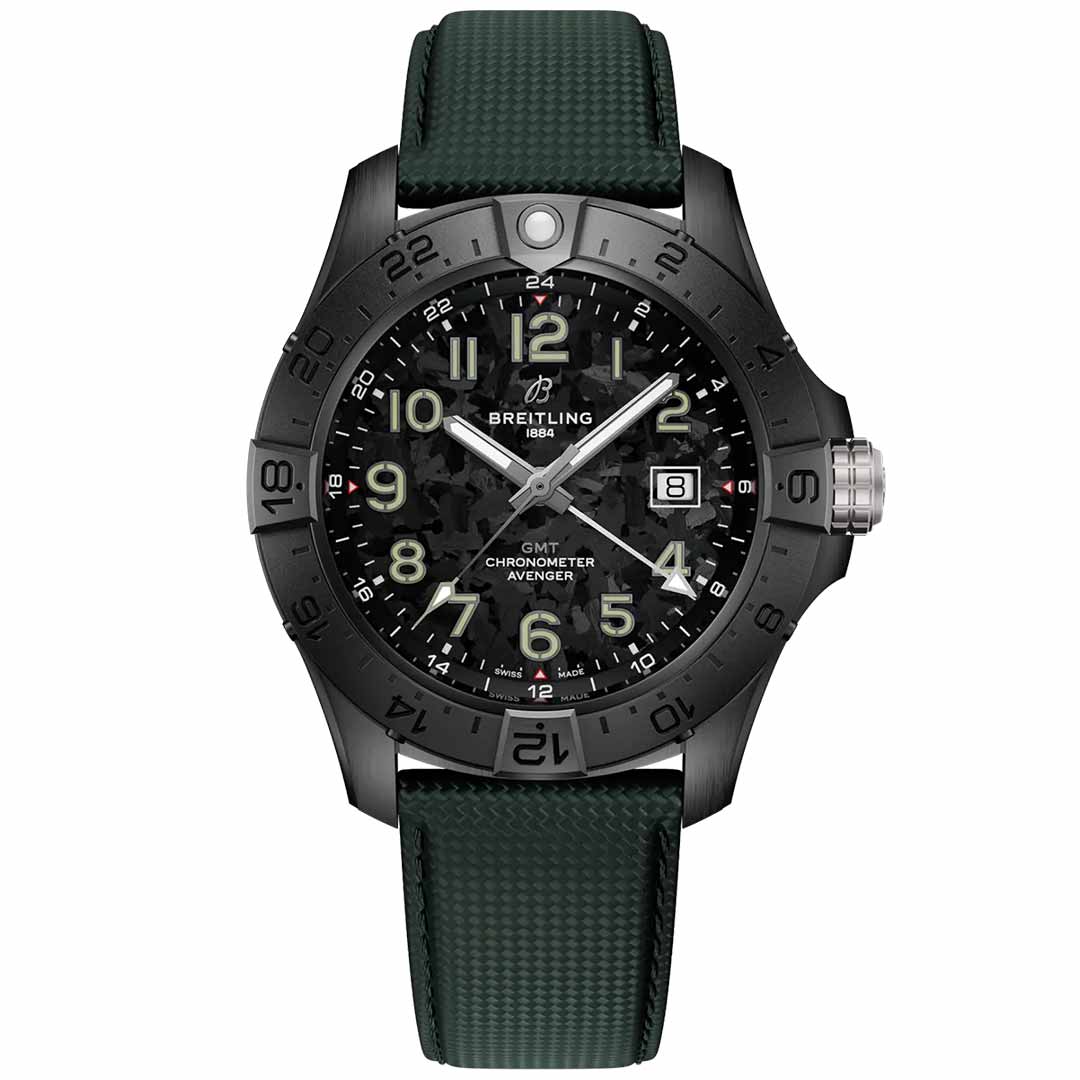 The elegant BREITLING Avenger Automatic GMT 44 Night Mission watch showcases an aviation-inspired design, complete with a black dial featuring luminescent hour markers and hands. It has a date window positioned at 3 o'clock and comes with a durable green strap. The watch is water-resistant and features a black bezel with etched numerals, complemented by a silver crown on the right side.