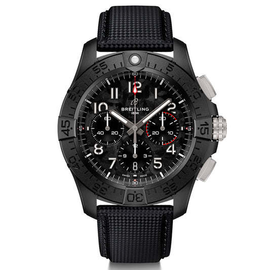 The BREITLING Avenger B01 Chronograph 44 Night Mission showcases extraordinary durability with a textured strap and a dark bezel highlighted by white and red accents. Its dial features three sub-dials, luminescent hands, a date window, and the Breitling brand name near the top, offering high-performance functionality.