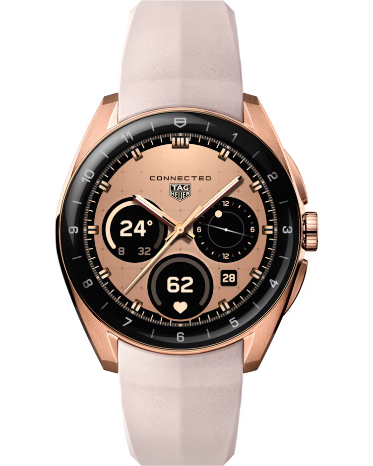 The TAG Heuer Connected Calibre E5 Golden Bright Edition 40mm Smart Watch features a round display in rose gold with a beige strap, showcasing digital dials for time, steps, heart rate, and date.