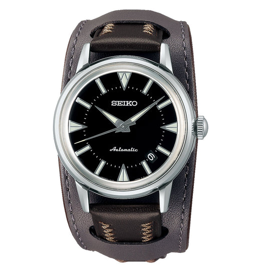 The Seiko Prospex Land 1959 Alpinist Re-Creation Limited Edition Automatic With Manual Winding 36.6mm Watch from Seiko features a sophisticated black dial with silver-tone markers encased in metal. Its elegance is enhanced by a brown leather strap with contrasting stitching and a small date window positioned at 4 o'clock, making this limited edition watch both refined and functional for divers.