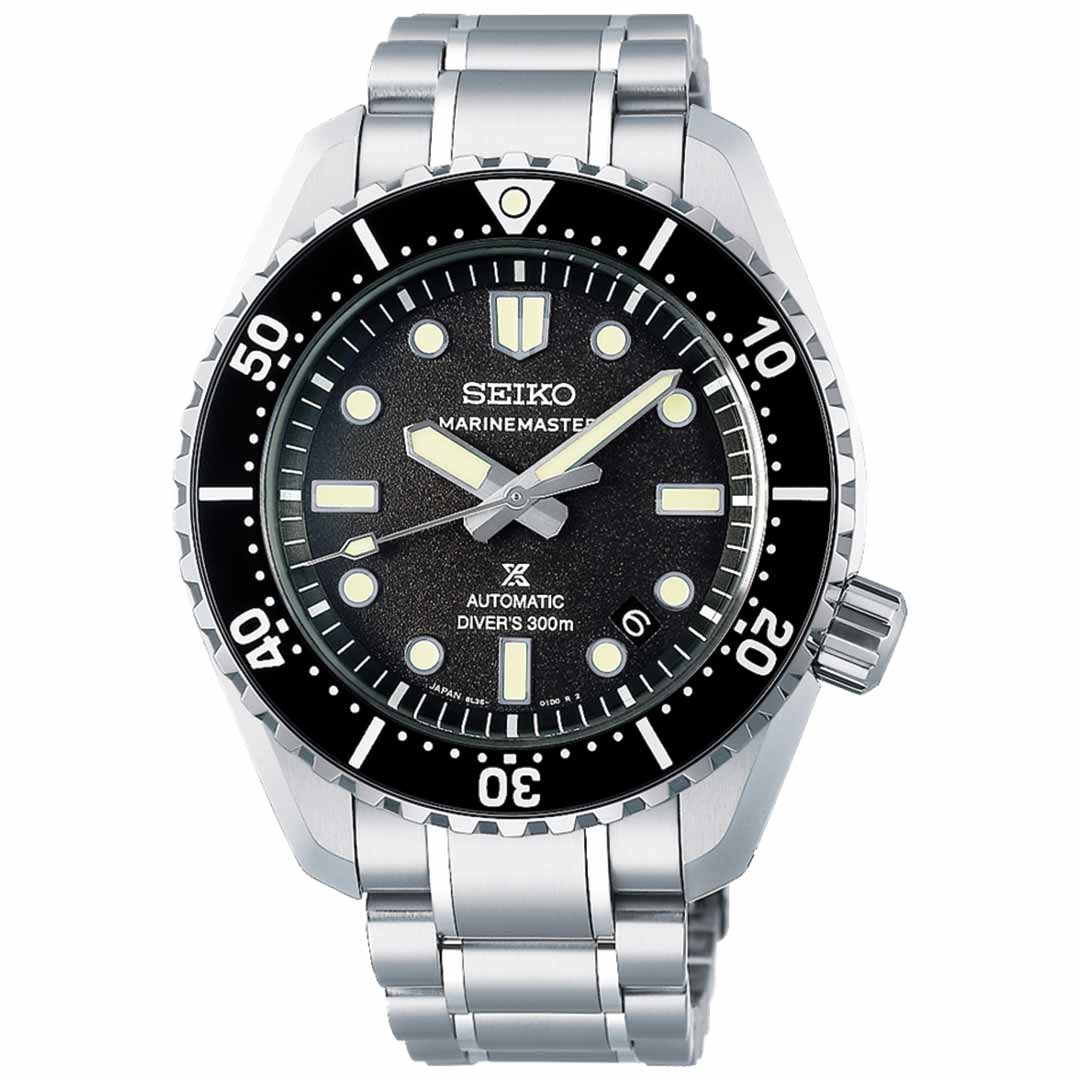 The Seiko Prospex Marinemaster Automatic With Manual Winding 42.6mm Watch features a robust metallic bracelet and showcases a black bezel with white numerals. It is powered by the high-performance Caliber 8L35, ensuring exceptional accuracy at depths of up to 300m. The watch also includes a sleek black dial with white hour markers and luminous hands, ideal for underwater precision.