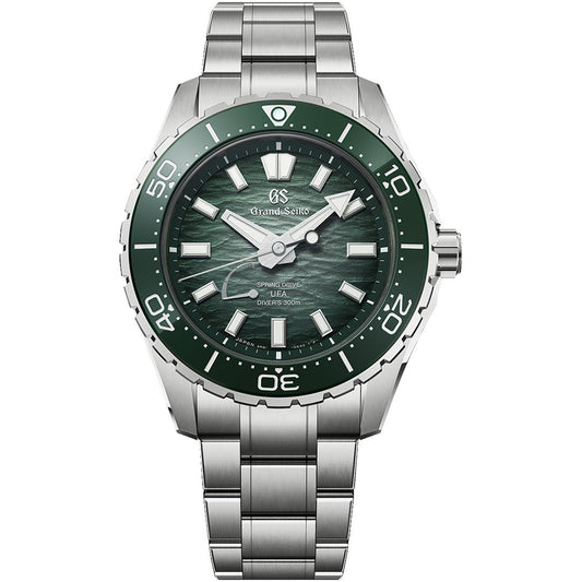 The Grand Seiko Evolution 9 Spring Drive U.F.A Ushio 300 Diver 40.8mm Watch features a stainless steel case, green bezel, textured green dial, luminous hands and markers, Caliber 9RB2 movement, date at 4 o'clock, and metal bracelet.