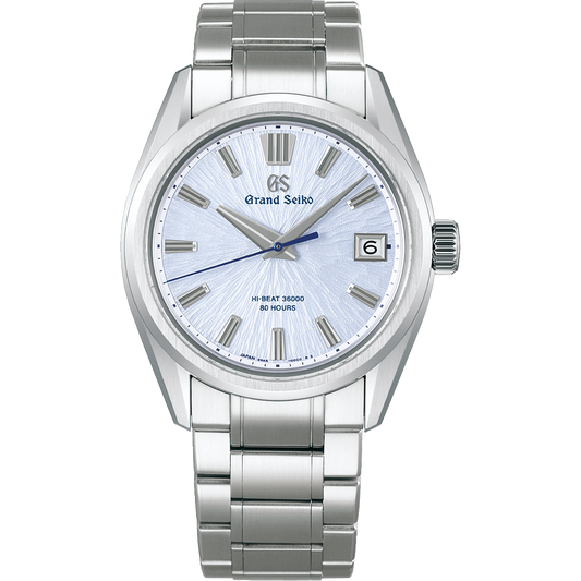 The Grand Seiko Evolution 9 Collection Hi-Beat 36000 Automatic 40mm Limited Edition watch features Ever-Brilliant Steel, a Mt. Iwate light blue dial, silver markers and hands, a date at 3 o’clock, and a polished silver bracelet.