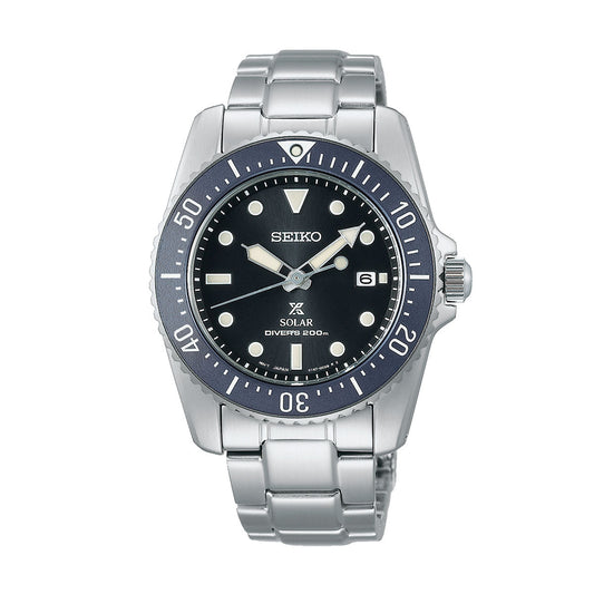 The Seiko Prospex Sea Solar 38.5mm Watch by Seiko features a stainless steel bracelet and a sleek black dial adorned with white hour markers. It includes a date window positioned at 3 o'clock and boasts a unidirectional bezel with minute markings, highlighting its innovative technology. This Solar Divers 200m is the perfect companion for underwater adventures.