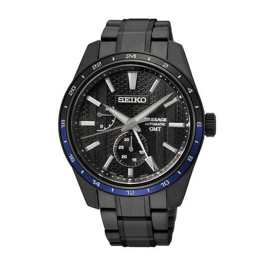 The Seiko Presage Sharp Edged Series Zero Halliburton Limited Edition Automatic Watch, measuring 42.2mm, boasts a sleek black stainless steel band. It embraces Japanese aesthetic sensibilities with its black dial, silver hour markers, luminescent hands, a date subdial, and a 24-hour blue-black bezel that highlights traditional craftsmanship.