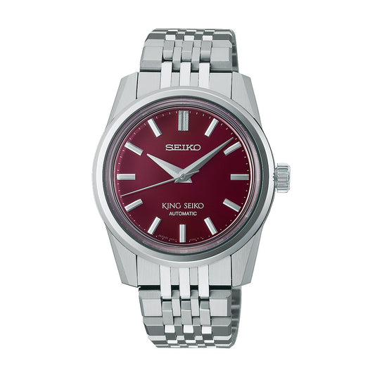 A Seiko King Seiko Automatic with Manual Winding 37mm watch featuring a stainless steel bracelet and a striking red dial. The face is adorned with silver hour markers and hands, proudly displaying the "Seiko" and "King Seiko Automatic" logos, powered by the reliable 6R31 movement.