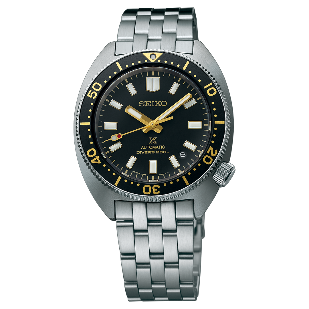 The Seiko Prospex Sea Automatic 41mm Watch by Seiko features a stainless steel band, a striking black dial with gold accents, and water resistance rated “Diver’s 200m.” Its black bezel with minute markers and gold-outlined hands combine style and performance, making it a standout sports watch.