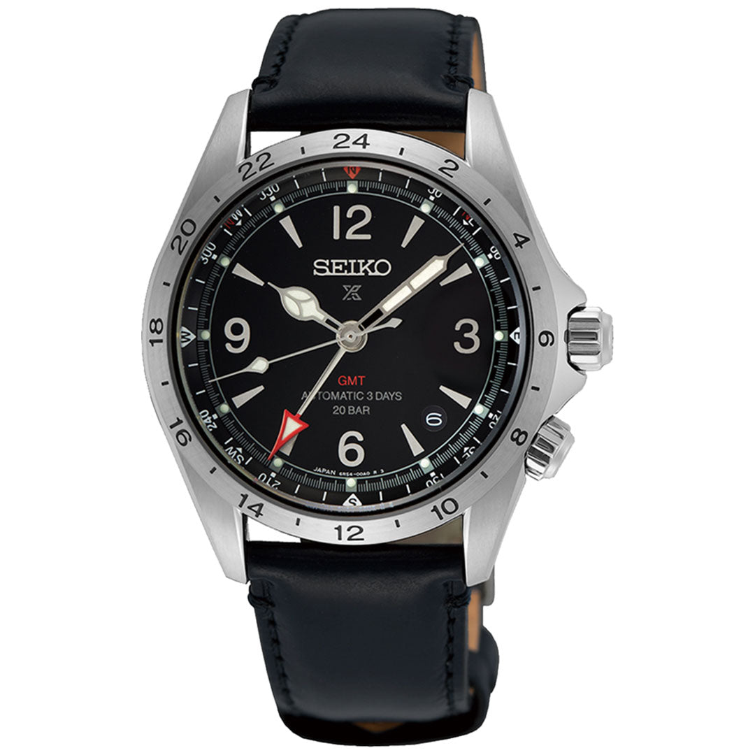 The Seiko Prospex Land Automatic With Manual Winding 39.5mm Watch, crafted by Seiko, features a black dial with prominent numerals and a date display. It has a stainless steel case, complemented by a black leather strap, and includes a GMT hand distinguished by its red arrow. This mechanical GMT watch is water-resistant up to 20 bar and is equipped with a power reserve for enhanced reliability.