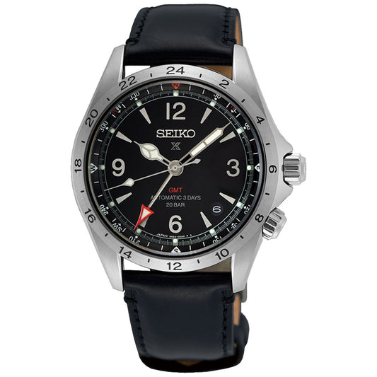 The Seiko Prospex Land Automatic With Manual Winding 39.5mm Watch, crafted by Seiko, features a black dial with prominent numerals and a date display. It has a stainless steel case, complemented by a black leather strap, and includes a GMT hand distinguished by its red arrow. This mechanical GMT watch is water-resistant up to 20 bar and is equipped with a power reserve for enhanced reliability.