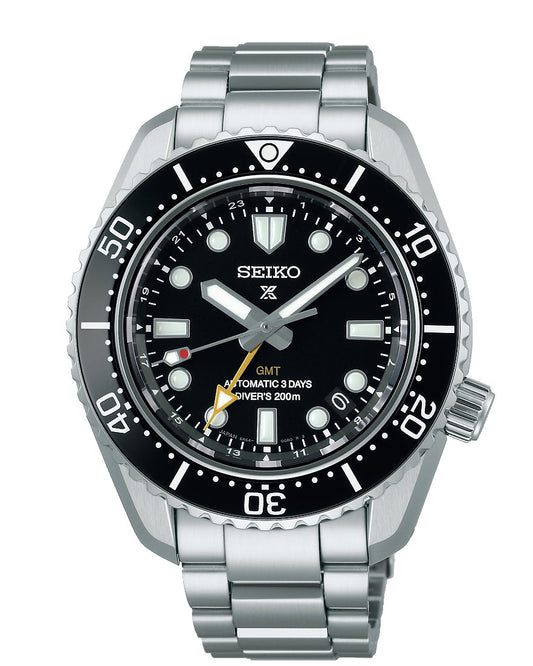 The Seiko Prospex Sea Automatic With Manual Winding 42mm Watch highlights a sleek silver design with a black bezel and dial, complete with luminescent markers. Equipped with a GMT function, this Seiko timepiece is water-resistant up to 200 meters and features an automatic movement paired with a robust stainless steel bracelet.