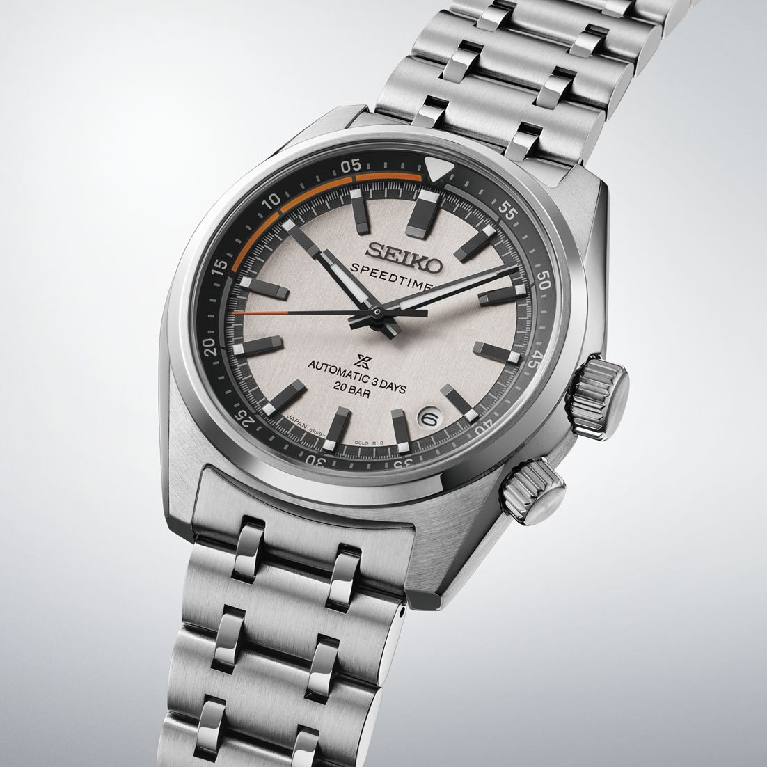 Seiko Prospex Speedtimer Automatic With Manual Winding 39.5mm watch in silver-tone, featuring a textured light gray dial with black indices, an orange-accented outer track, and a stainless steel link bracelet.