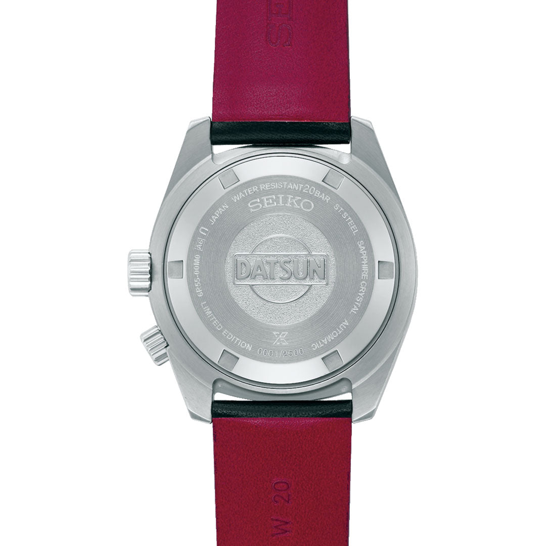 Back view of the Seiko Prospex Speedtimer Datsun 240Z Automatic 39.5mm Limited Edition, showing a red and black strap and stainless steel case back engraved with “DATSUN” and model details, including water resistance.