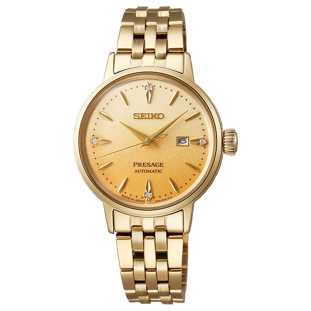 The Seiko Presage Cocktail Time Automatic with Manual Winding 30.3mm Watch features a gold link bracelet, gold dial, date display at 3 o'clock, and three diamond-like markers at the 3, 6, and 9 o'clock positions.