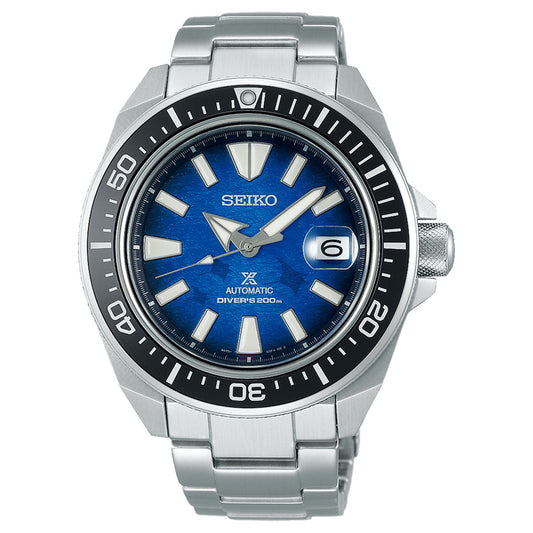 The Seiko Prospex Sea Save The Ocean Special Edition Automatic Watch features a captivating blue dial, accentuated by striking white hour markers and a date window at the 3 o'clock position. Its black rotating bezel displays clear white numbers for enhanced readability. Equipped with advanced technology, this timepiece is designed with a durable stainless steel bracelet.