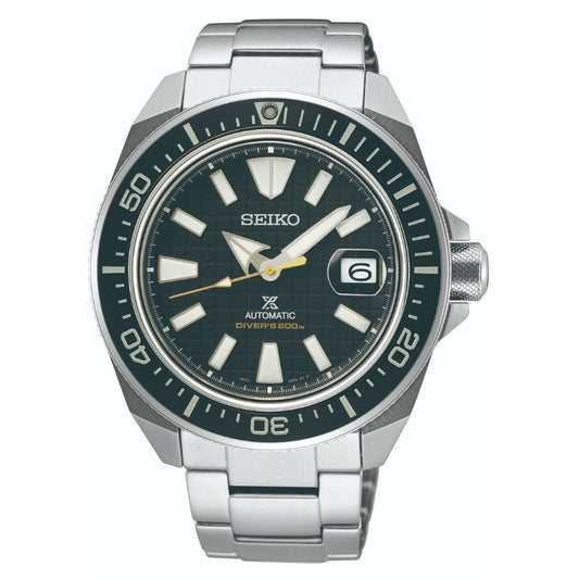 The Seiko Prospex Sea Automatic With Manual Winding 43.8mm Watch, in silver, is a must-have for adventure seekers. It features a black dial with white and silver hour markers and hands, along with a date window at 3 o'clock. The watch also includes an automatic movement indicator and a black bezel with silver numerals that enhance its sleek design.
