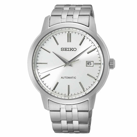 The Seiko Essentials Automatic 41.2mm Watch by Seiko features a silver stainless steel bracelet and is driven by the precise Calibre 4R35 movement. It includes a white dial with silver hour markers and hands, as well as a date window at the 3 o'clock position, encapsulating timeless elegance.