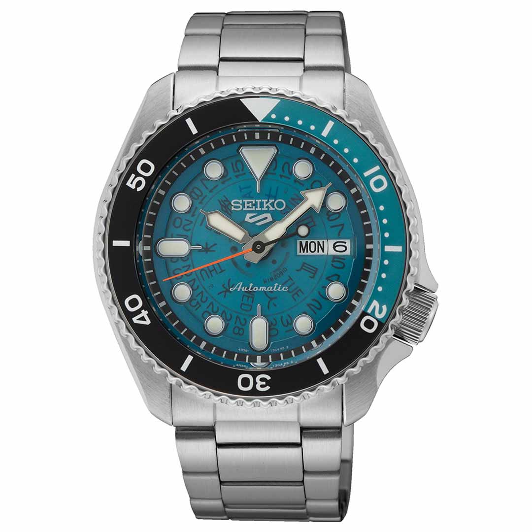 The Seiko 5 Sports SKX Series Automatic 42.5mm Watch by Seiko features a stainless steel case and bracelet, a striking blue and black rotating bezel, and an eye-catching turquoise dial. It includes a day and date display, with luminous hour markers and hands for easy readability.