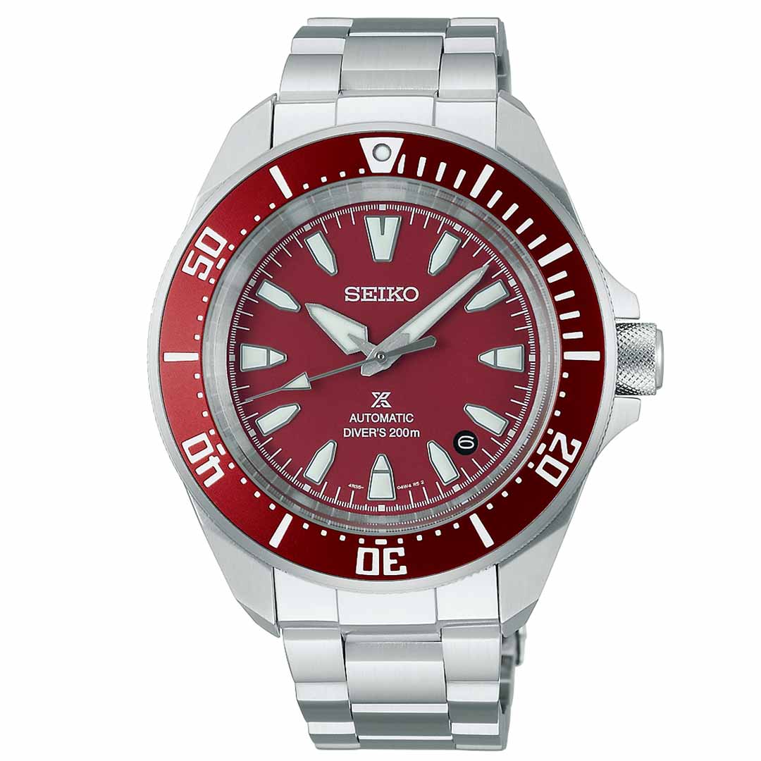 The Seiko Prospex Sea Automatic 41.7mm Watch is a silver dive watch that features an automatic movement, a striking red bezel and dial, large bold hour markers and hands, a date window at the 3 o'clock position, and boasts an impressive water resistance rating of 200 meters.