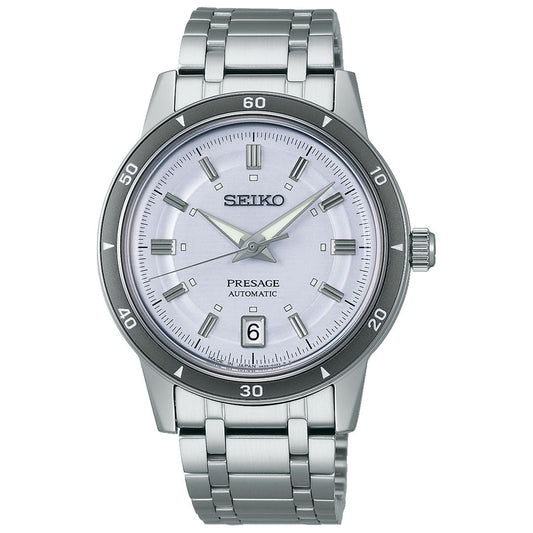 The Seiko Presage Style 60's Automatic with Manual Winding 39.5mm Watch features a round white dial, silver hour markers and hands, a date window at 6 o'clock, and a stainless steel bracelet.