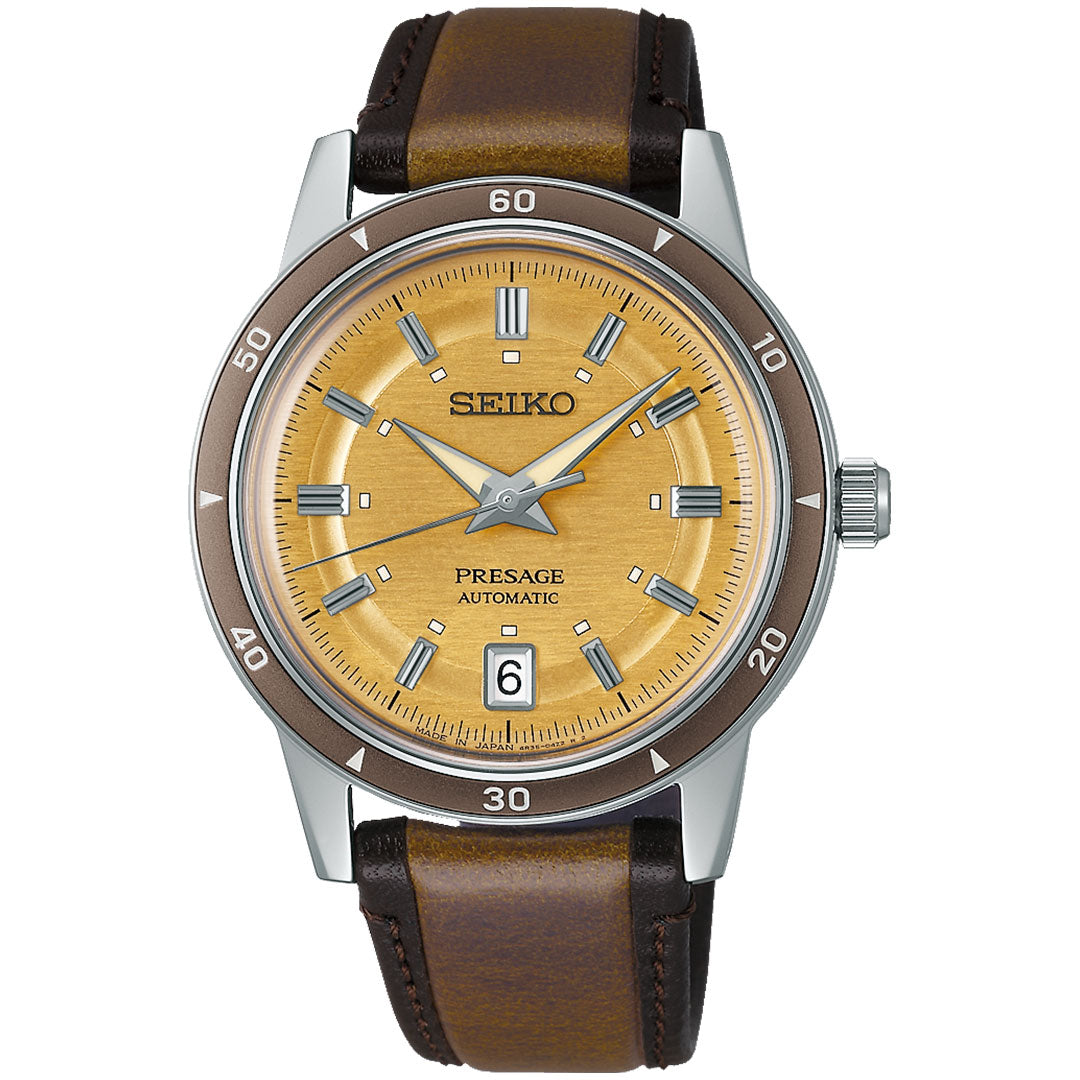 The Seiko Presage Style 60's Automatic with Manual Winding 39.5mm Watch features a brown leather strap, stainless steel case, textured gold dial, silver hour markers, date window at 6 o'clock, and a numbered brown bezel.