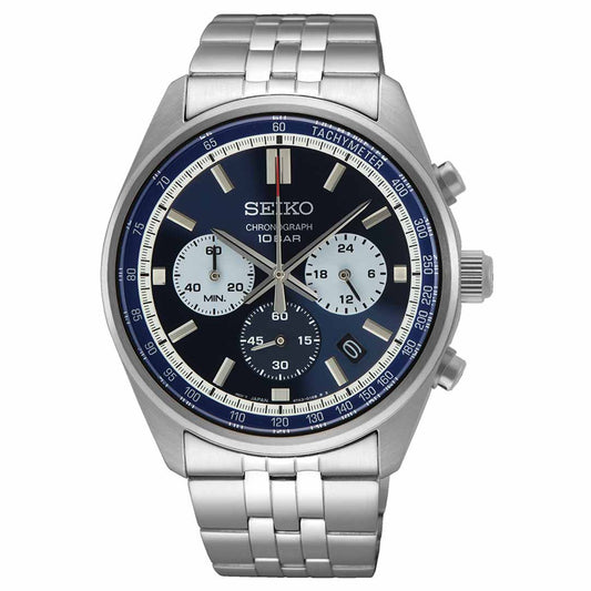 The Seiko Essentials Quartz 41.5mm Watch features a stainless steel build with a striking blue dial, incorporating three chronograph subdials and a tachymeter bezel. The elegant link bracelet enhances its precision-crafted appearance, highlighted by the prominent "Seiko" branding and "Chronograph 10 Bar" marking for a refined finish.