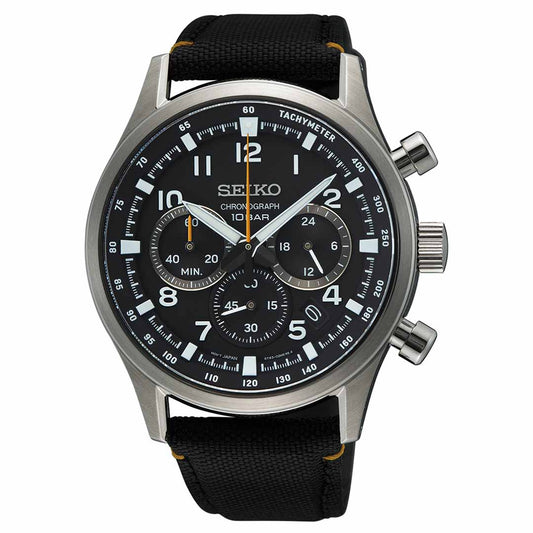 The Seiko Essentials Quartz 43mm Watch from Seiko features a stainless steel case, black dial, and sapphire crystal. Its sleek design includes white hour markers, three sub-dials, a date display, and a tachymeter on the bezel, all complemented by a durable black fabric strap.