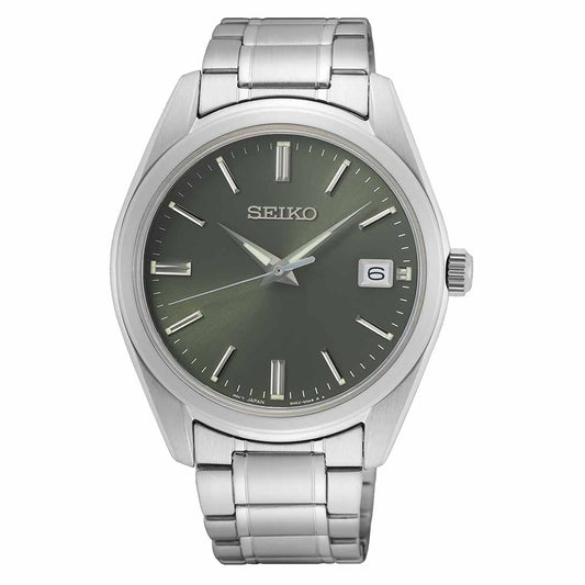 The Seiko Essentials Quartz 40.2mm Watch by Seiko boasts a polished, elegant design with a green face and a stainless steel band. It includes silver hour markers, hands, and a date window at the 3 o'clock position, all safeguarded by durable sapphire crystal.