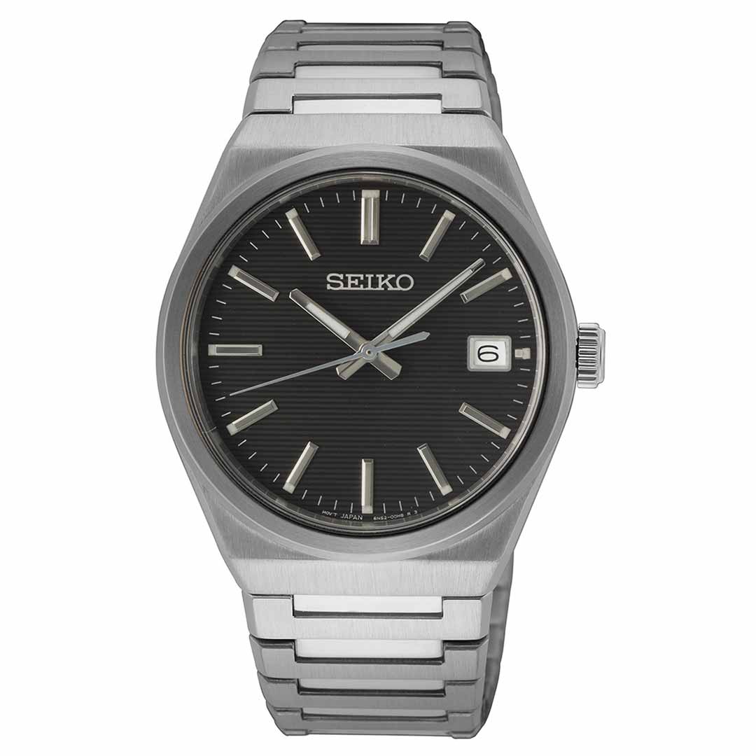 Introducing the Seiko Essentials Quartz 39mm Watch by Seiko, a stylish stainless steel timepiece featuring a sophisticated black dial with silver hour markers and hands. It offers a convenient date display at the 3 o'clock position and is complemented by a polished metal link bracelet.