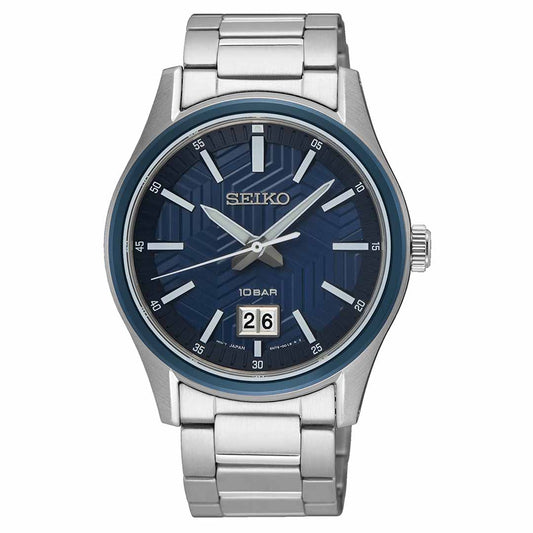 The Seiko Essentials Quartz 39.5mm Watch by Seiko features a blue dial with silver hour markers and hands alongside a date display positioned at 6 o'clock. Its polished stainless steel bracelet and sapphire crystal elevate the watch's sleek design.