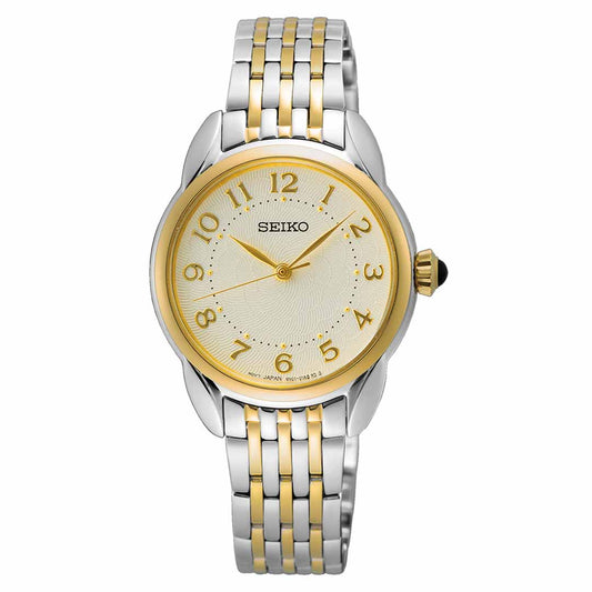 The Seiko Essentials Quartz 28.7mm Watch from the renowned brand Seiko features an elegant design, showcasing a classic round gold-tone dial with gold Arabic numerals and a two-tone, gold-plated stainless steel bracelet.