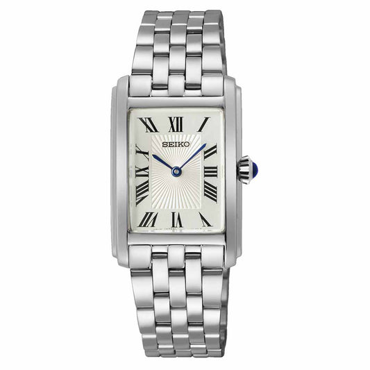 The Seiko Essentials Quartz 22.2mm Watch, by Seiko, features a silver rectangular stainless steel case and link bracelet. Its sophisticated dial is adorned with Roman numerals and two bold blue hands, all shielded by Hardlex Crystal.