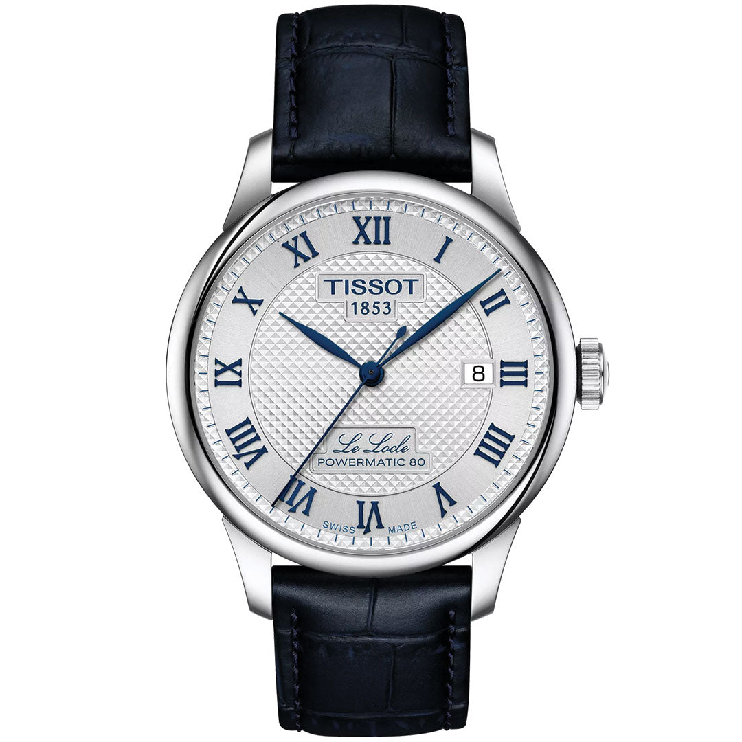 The Tissot Le Locle 20th Anniversary Powermatic 80 Automatic 39.3mm Watch features a silver textured dial with blue Roman numerals, date at 3 o’clock, black leather strap, and an 80-hour power reserve display above 6 o’clock.