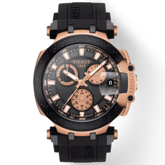 The Tissot T-Race Chronograph Quartz 43mm Watch by Tissot boasts a sporty design with a black rubber strap, black bezel, and rose gold accents. It features a dial equipped with three subdials, luminescent hour markers, and a date function driven by Swiss quartz movement.