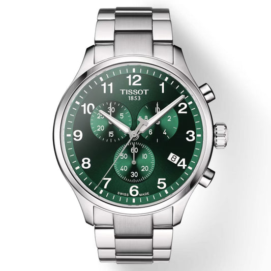 Explore the Tissot Chrono XL Classic Quartz 45mm Watch: a sleek silver wristwatch boasting a spacious case and vibrant green dial. It includes three subdials and a precise chronograph function. The polished stainless steel bracelet, along with striking white numerals, beautifully highlights the brand name "Tissot" situated below the 12 o'clock mark, complemented by a convenient date display.