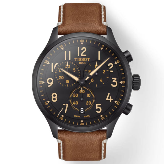Introducing the Tissot Chrono XL Quartz 45mm Watch, a sophisticated timepiece by Tissot. It showcases a brown leather strap and a black dial adorned with prominent gold-colored numerals and three sub-dials. This watch is powered by Swiss Quartz Movement, with gold-colored hands moving gracefully beneath a scratch-resistant sapphire crystal. Two pushers complement the crown on the right side, adding to its elegant design.
