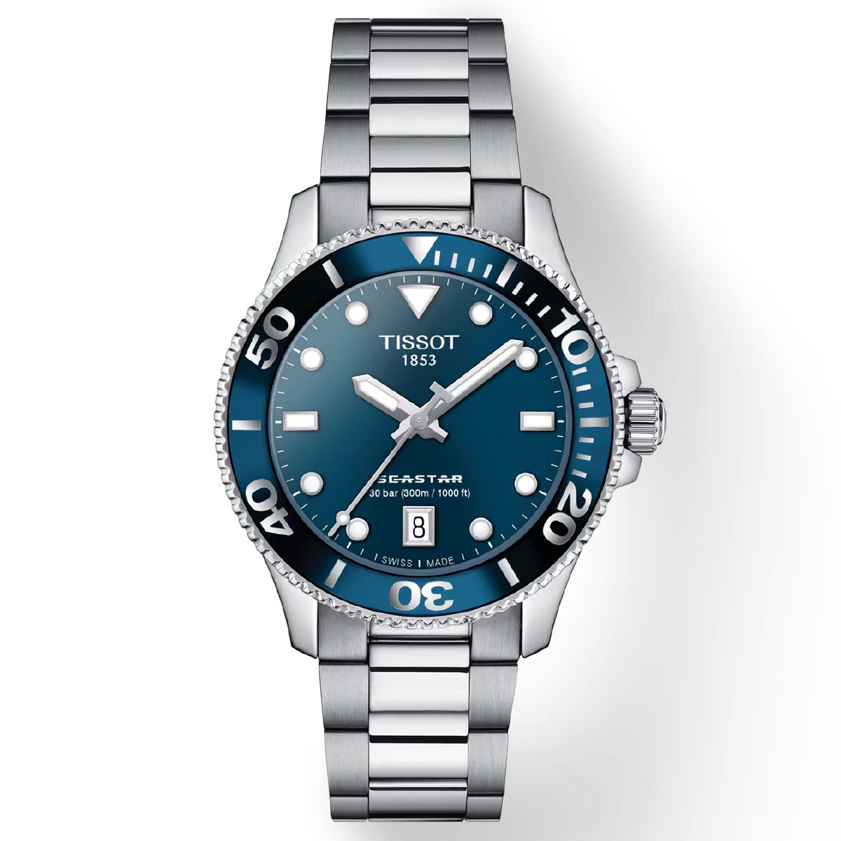 The Tissot Seastar 1000 Quartz 36mm Watch is an ideal choice for water sports enthusiasts. It features a blue dial with silver hour markers and luminous silver-tone hands, complemented by a date window positioned at 6 o'clock. The watch is equipped with a black bezel showcasing white numbering and includes a robust 316L stainless steel bracelet.