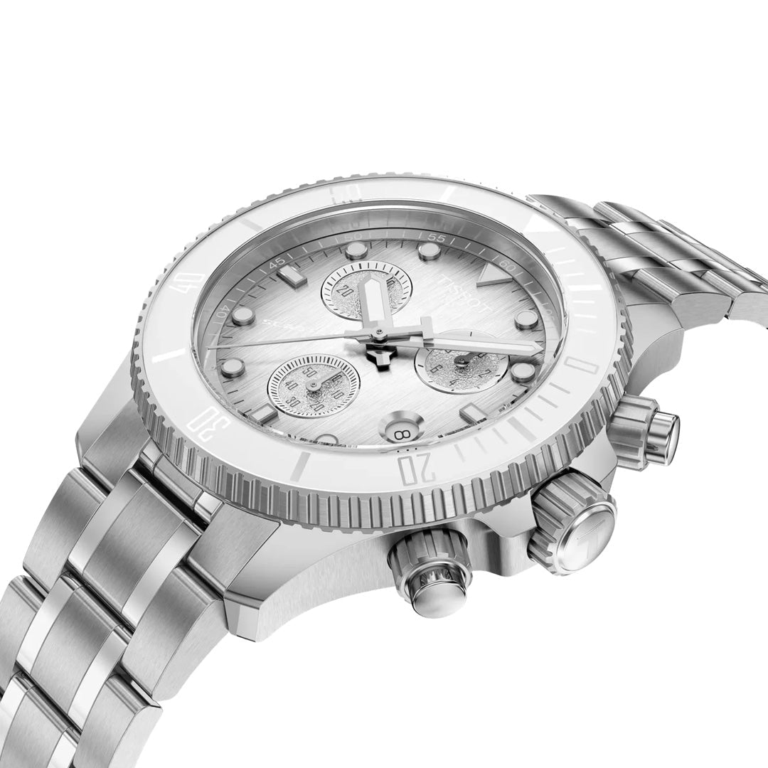 The Tissot Seastar 1000 Quartz 38mm Watch by Tissot features a silver stainless-steel chronograph design, complete with a 38mm stainless-steel case, three subdials, knurled bezel, and prominent side crowns. Shown at an angle against a white background, this Swiss quartz chronograph highlights its sophisticated and water-resistant craftsmanship.