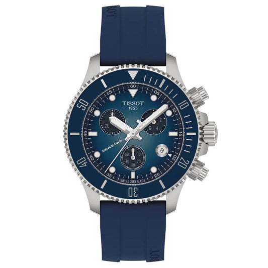 The Tissot Seastar 1000 Quartz 38mm Watch by Tissot features a bold blue rubber strap, an eye-catching blue gradient Seastar dial with three subdials, white hour markers, and a silver bezel complemented by three prominent side crowns. This men's watch also offers a tachymeter scale, striking white hands, and is powered by an accurate Swiss quartz chronograph movement.