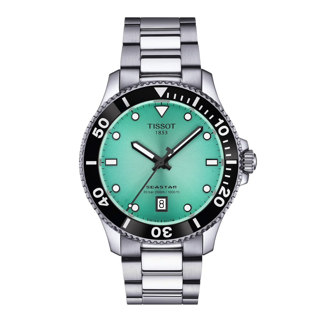 Introducing the Tissot Seastar 1000 Quartz 40mm Watch—a stunning example of Swiss craftsmanship from Tissot. This timepiece features a silver metal band, a striking turquoise dial, black bezel, white markers, and a date display at the 6 o’clock position. With an impressive water resistance of 300m, the Seastar 1000 Quartz combines exceptional style with outstanding functionality.