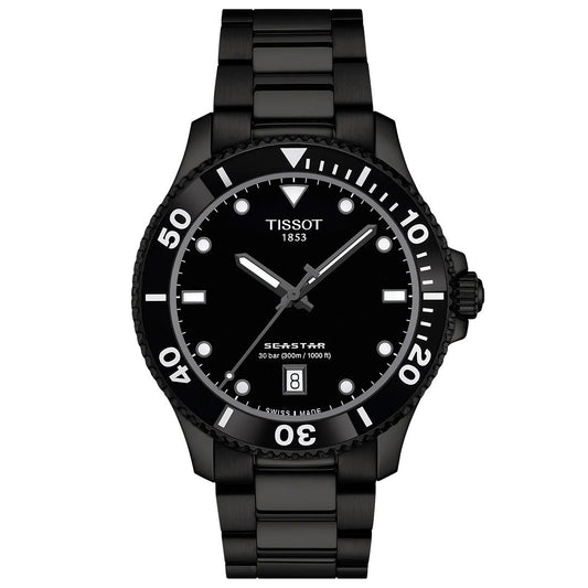The Tissot Seastar 1000 Quartz 40mm Watch features a black dial, white markers, date window at 6 o’clock, metal band, and diving bezel. Swiss-made, by Tissot, this watch offers water resistance up to 300 metres.