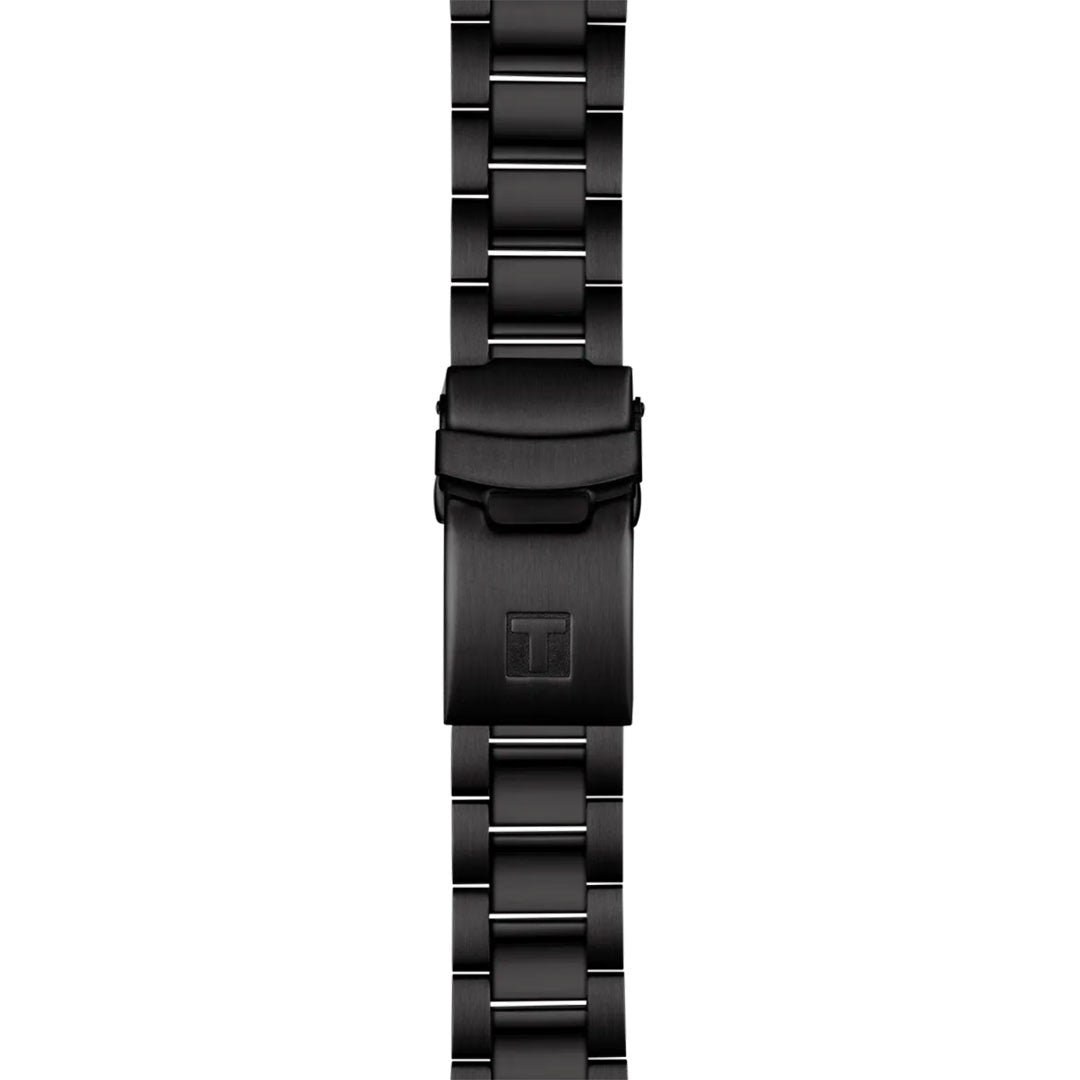 A close-up of the Tissot Seastar 1000 Quartz 40mm Watch shows its black metal band with a brushed finish and an engraved "T" clasp, showcasing Tissot’s Swiss craftsmanship and the Seastar's robust water resistance.