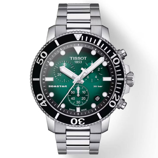 The Tissot Seastar 1000 Chronograph Quartz 45.5mm Watch, crafted by Tissot, is ideal for watersports with its stainless steel design. It features a green and black dial with three sub-dials and a date window. The screw-down crown enhances water-resistance, while the prominent hour markers and numbered bezel contribute to its sleek appearance.