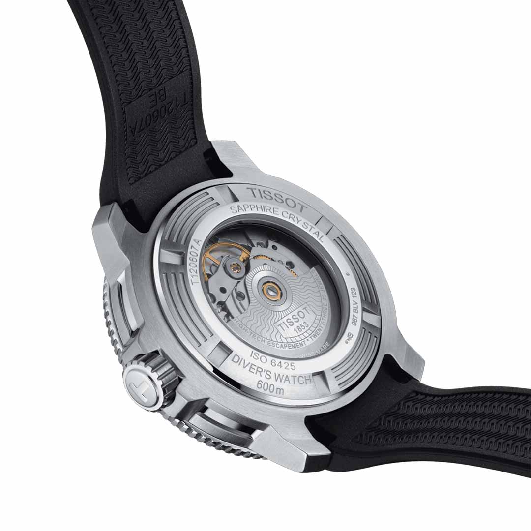 The image features the back of the Tissot Seastar 2000 Professional Powermatic 80 Automatic 46mm Watch, displaying its visible automatic movement. The watch boasts a stainless steel case back, a sapphire crystal display, and a black rubber strap that enhance its nautical style. Additionally, it is water-resistant up to 600 meters.