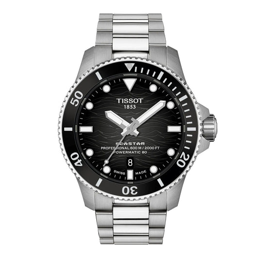 The Tissot Seastar 2000 Powermatic 80 Automatic 44mm Watch is a striking diving timepiece featuring a silver stainless steel bracelet, black dial with silver hour markers, date display at 6 o’clock, and a bold black bezel with white numerals. Expertly crafted for both precision and style, this automatic watch from Tissot is designed to accompany you on any adventure.