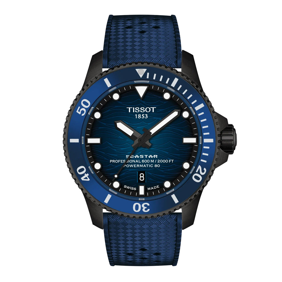 The Tissot Seastar 2000 Powermatic 80 Automatic 44mm Watch by Tissot features a blue and black design with a wave-patterned dial, bold indexes, rotating bezel, and blue textured strap—expertly crafted as a high-performance diving timepiece.