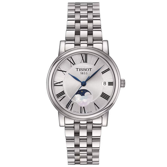 The Tissot Carson Premium Lady Moonphase Quartz 32mm Watch boasts a silver metal link bracelet and is equipped with a scratch-resistant sapphire crystal. Its watch face is adorned with Roman numerals, features a date window at the 3 o'clock position, and includes a moon phase indicator at 6 o'clock. The dial elegantly displays "Tissot 1853," symbolizing Swiss quartz movement craftsmanship.