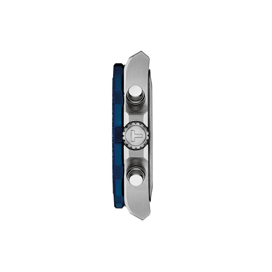 Side view of the Tissot Supersport Chrono Quartz 42mm Watch in silver and blue, showcasing its sports chronograph case with two pushers and a crown—each positioned on the right side. The crown displays an embossed Tissot logo. The modern, sporty design exemplifies the distinctive collection available at Raffi Jewellers.