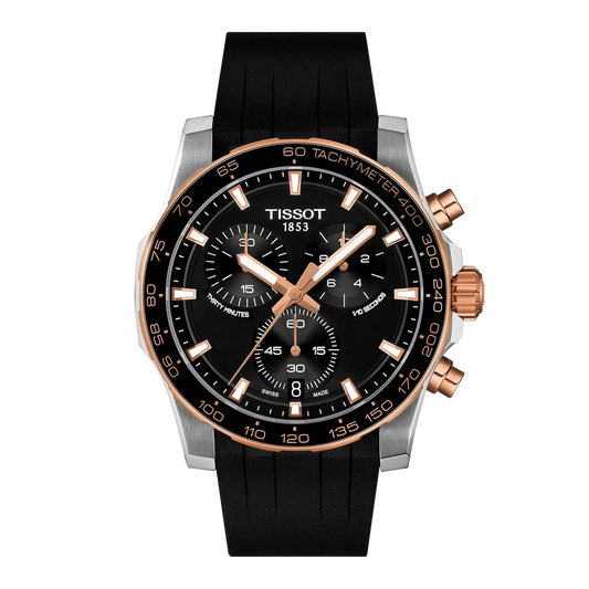 Tissot Supersport Chrono Quartz 42mm Watch with a black dial, gold-tone accents, three sub-dials, a tachymeter bezel, and a black silicone strap.